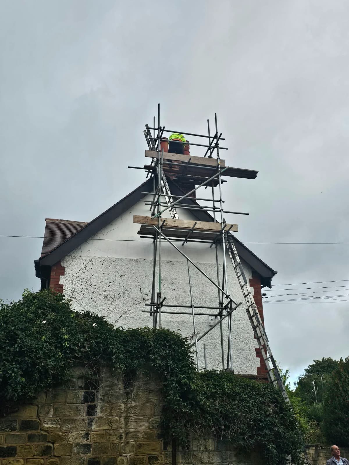 Scaffolding erected around a chimney stack for repair work
